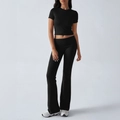 Women's 2-piece set featuring black short sleeve crop top and flared leggings - S / Black