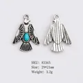 Ethnic vintage style eagle pendant with turquoise stone inlay in silver alloy - Eagle