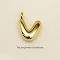 Polished gold 3D bubble letter V pendant with a high-shine mirror finish for jewelry - Letter V