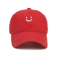 Kids red cotton baseball cap featuring a white embroidered smiley face on the front - Kids 52-54cm / Red