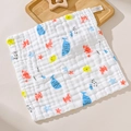 Soft white cotton baby washcloth with cute ocean sea life patterns on a wooden tray - Ocean Kingdom