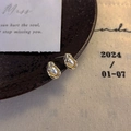 Elegant gold-trimmed round pearl stud earrings with a vintage irregular metallic frame - Bezel Round Pearl