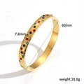Gold honeycomb bangle with multicolored crystals in stainless steel shown at 45-degree angle - Gold Honeycomb Multicolor Zircon Style (TB7185)