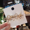 Champagne crystal butterfly hair clip with gold metal base on a white card - Butterfly Pink Spring Clip