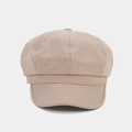 Close-up of khaki cotton newsboy cap showing detailed octagonal panel stitching and fabric texture - Light Khaki