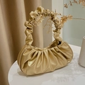Champagne gold ruched cloud bag in synthetic leather with elegant pleated handle - Gold