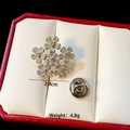 Detailed view of silver snowflake brooch with crystals, size 2.4cm and weight 4.8g - Snowflake Shape (D022)
