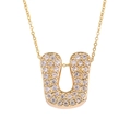 Golden micro-paved zircon necklace featuring cursive letter U pendant on a fine chain - Letter U / Gold