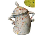 Polka dot ceramic canister with lid and curly handles in colorful speckled finish - Colorful