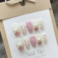 Pink and white handmade press-on nails with 3D bows and hand-painted hearts - L / Princess Sweetheart