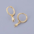 Macro view of gold S925 sterling silver hoop earrings with rock and peace sign charms - Victory Gesture - Gold