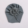 Dusty blue infant turban hat featuring ribbed knit fabric and a stylish top knot floral detail - Grey Blue