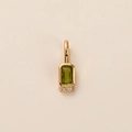 Macro detail of a gold birthstone pendant with emerald green and zircon accents - Pendant Only / August (Peridot)