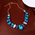 Detail of blue and white faux gems on a gold necklace over red silk background - 29# Gold Bright Blue Iridescent Style