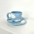 Handcrafted light blue ceramic coffee cup and saucer set with 3D white cloud patterns - 340ml / White Clouds