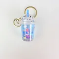 Blue cat bubble milk tea keychain with floating sakura glitter and gold metal ring - Blue Flower