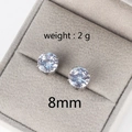 Detail of 8mm four-prong round zircon stud earring weighing 2g in a velvet jewelry box - 8mm / Platinum
