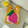 Detailed close-up of a yellow knitted tote bag featuring a vibrant pink strawberry pattern - Strawberry Yellow