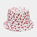 White bucket hat featuring an all-over red cherry print with green leaves - M (56-58cm) / Many Small Cherries White