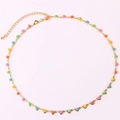 Detailed view of gold chain necklace with colorful enamel heart charms on pink background - Multicolor Necklace 4 (Pastel Mix)