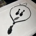 Vintage style two-piece jewelry set featuring dark rhinestone floral heart pendants - Black (Necklace & Earrings Set)