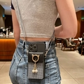 Detail of crossbody phone case with houndstooth pocket, gold cat ears and pearl tassel - Black TPU - Cat Head Houndstooth Wallet / iphone12MINI-5.4