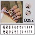 Press-on nails D092 with black flame patterns and small rhinestones on nude base - D092 (Glue Type)
