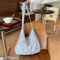 Detailansicht der großen Canvas-Einkaufstasche mit lebhaftem lila Blumenmuster - Cord Helllila Blumen