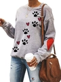 Gray long sleeve sweatshirt with heart and paw print graphic on plain background - Grey Heart Paw Mix
