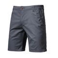 Detail of dark grey cotton shorts showing button fly and side pockets on white background - Dark Gray