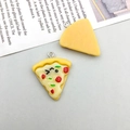 Close-up of cute cartoon pizza resin charms with smiley face details for DIY crafts - 1Pc Yellow Resin Triangle Emoji Pizza
