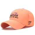 Orange-pink cotton baseball cap with purple letter embroidery and curved brim style - Orange