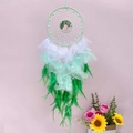 Handmade dream catcher with tree of life design and green feathers on pink background - 9182A Green Tree of Life