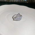 Detailed macro view of silver leaf ring with sparkling clear zircon stones on ceramic tray - 29# Ring - Silver - Wheat Ears