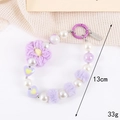 Sweet purple floral phone strap with acrylic hearts, pearls, and plush flower charms - Purple