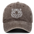 Detailed view of white tiger head embroidery on a washed cotton vintage baseball cap - Coffee