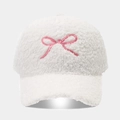 Close-up of white lamb wool texture and pink bow embroidery on the baseball cap - Adjustable / White Bow