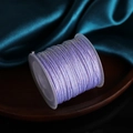 0.8mm purple polyester braided cord roll for DIY handmade jewelry on a wooden tray - Light Purple