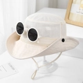 Detail of white mesh kids sun hat with decorative round goggles and adjustable strap - 54cm (3-8 Years) / Off White