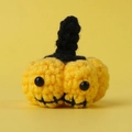 Handmade crochet pumpkin keychain in yellow yarn with cute black bead eyes and stem - Yellow Smiley Pumpkin