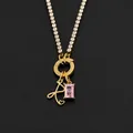 14K gold-plated stainless steel necklace with pink stone and letter R pendant - Letter R