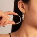 Chic silver geometric hoop earrings with sparkling rhinestones worn on ear model - #17 Silver Needle Silver Twisted Zircon Hoop