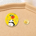 Panda and persimmon enamel pin with lucky Chinese characters on a yellow background - Panda Everything Goes Well