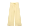 Detail of pale yellow wide-leg trousers with drawstring elastic waist for casual wear - XS / Bottoms / Yellow