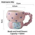 Hand-painted embossed ceramic mug with flower pattern and unique beaded handle design - Beaded Small Flower