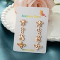 Rose gold stainless steel bee and honeycomb stud earring set on white display card - Rose Gold
