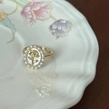 Gold butterfly ring with oval rose pattern and pearl border on ceramic plate - Vintage Pearl Rose