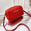 Red quilted crossbody bag with gold metal logo and adjustable leather shoulder strap - Red