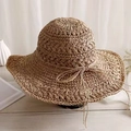 Foldable wide brim straw sun hat with bow tie decoration and wavy crochet pattern - Khaki