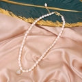 Elegant natural freshwater pearl necklace with a golden smiley face pendant - Deer Necklace
